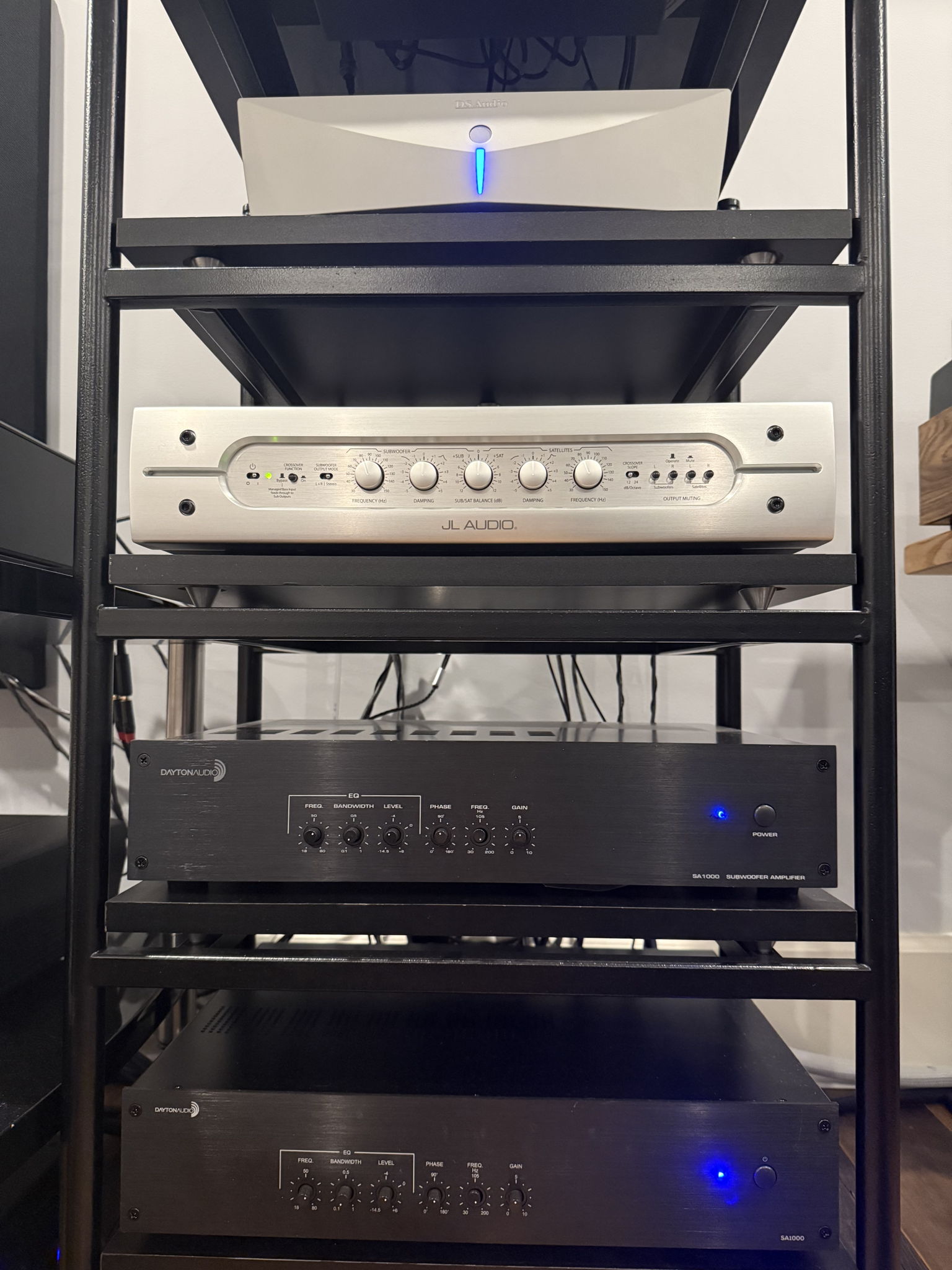 Black Diamond Racing Shelf for the Source, DS Audio DS003 Equalizer, JL Audio CR-1 crossover, Dayton Audio SA-1000 subwoofer amplifiers, SolidSteel 410 rack