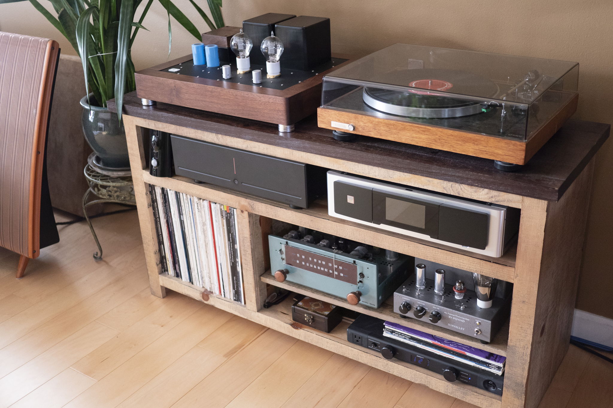 Hodgepodge of equipment in one of six systems in my house: Arte Forma Jadeite preamp, Starke Sound AD4 amp, NAD 50.2 digital server, Sun Valley 1616 Phono Preamp, Custom built turntable with Grace 707 tonearm, Bogen R-640 AM/FM tuner