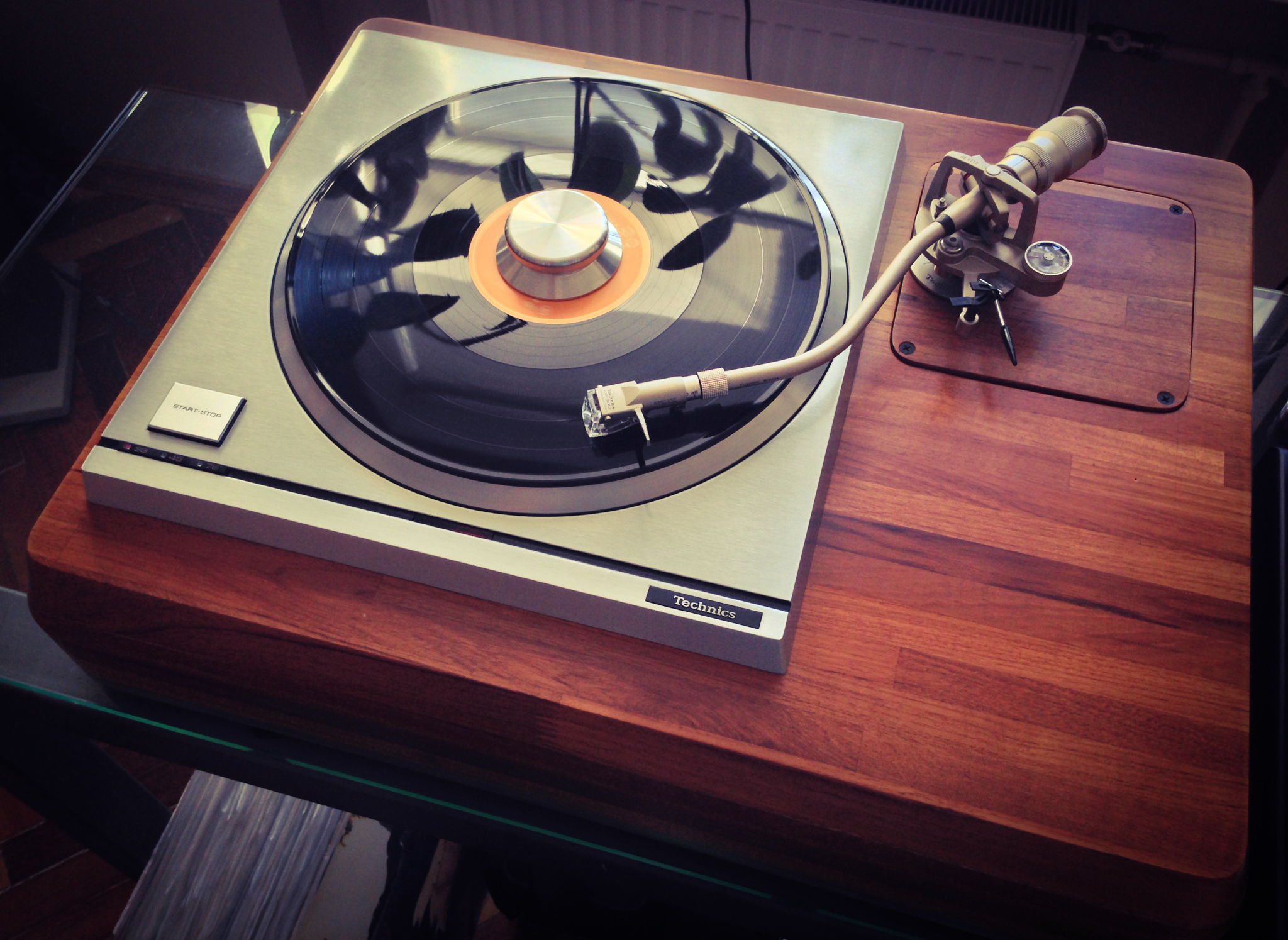 Complete Technics turntable in a custom made teak wood plinth. 