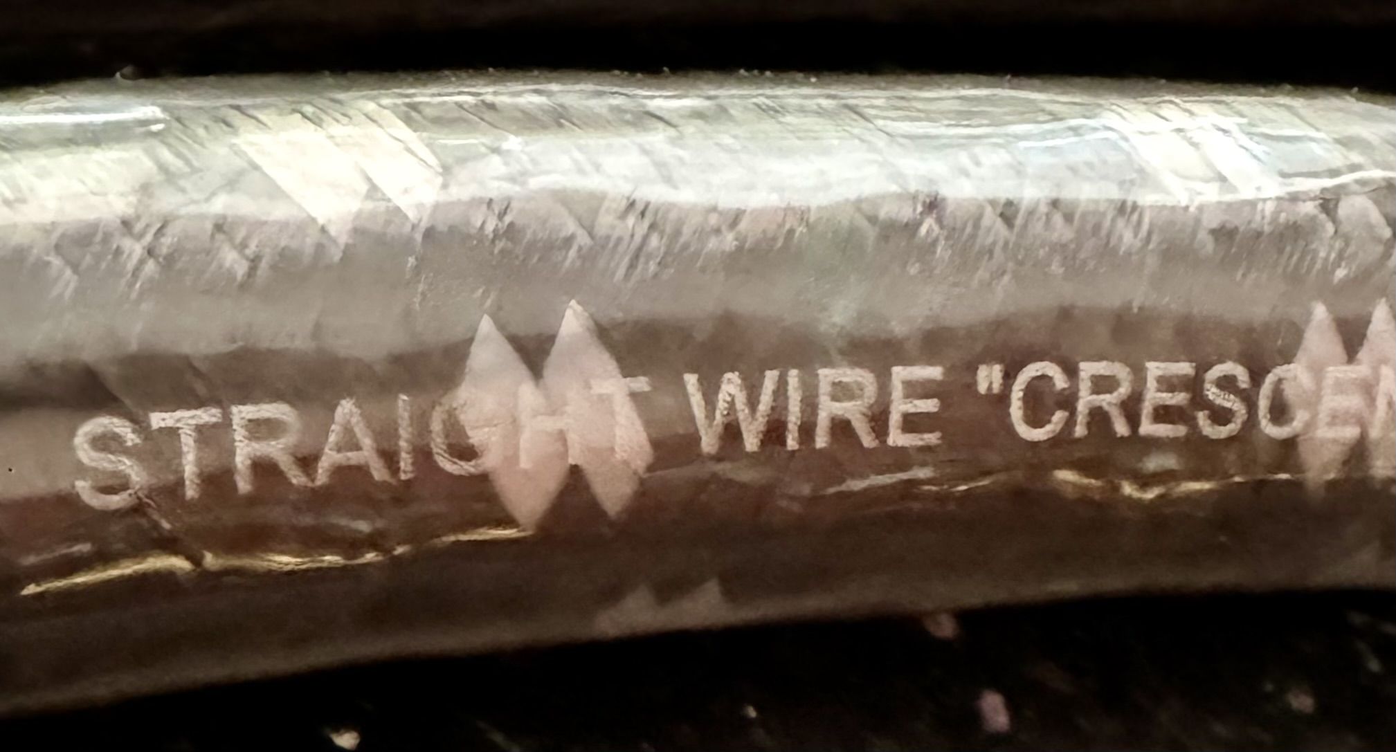 Straight Wire name brand up close.