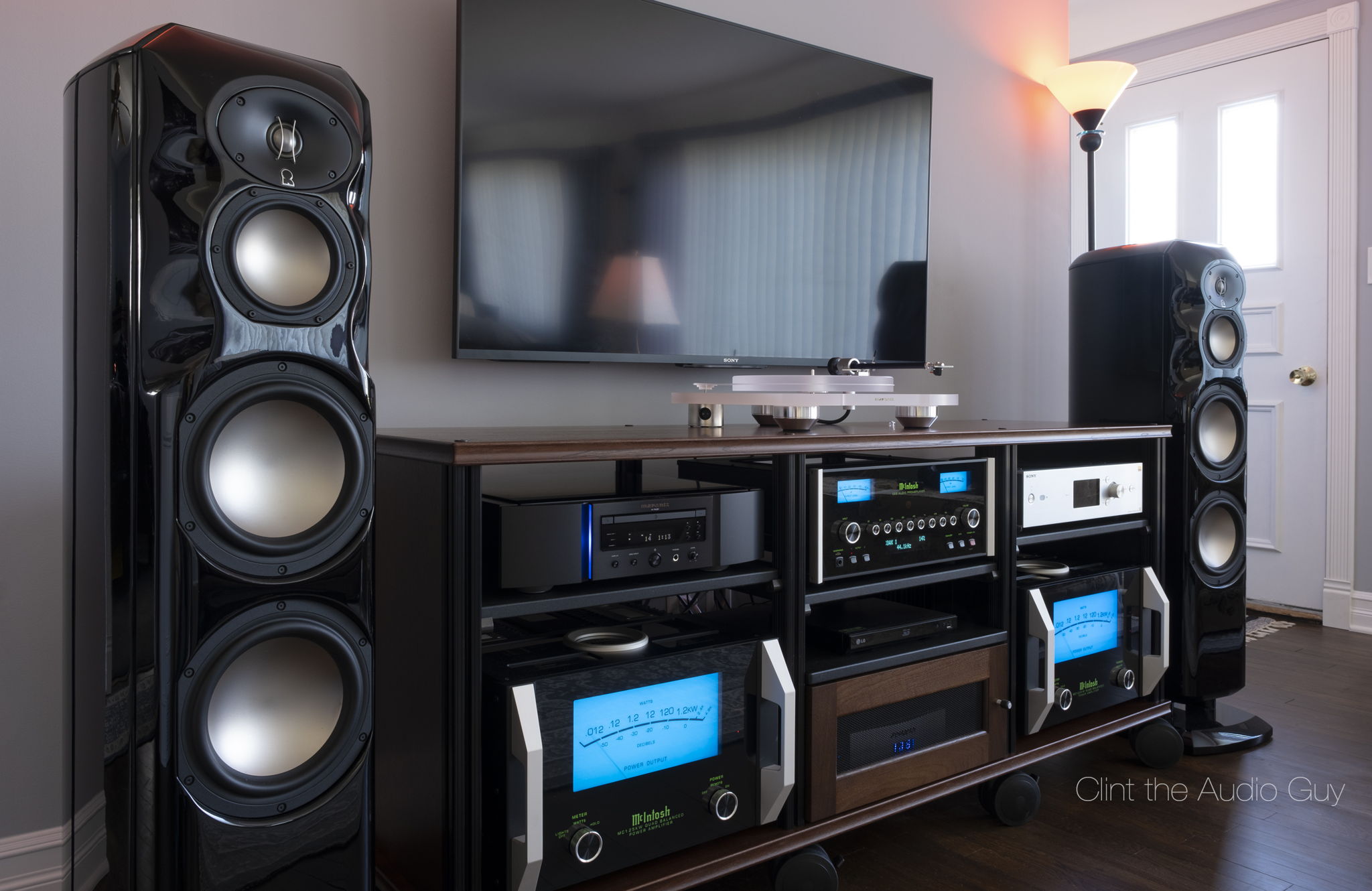 Completely rebuilt the system! New C53 preamp, MC1.25KW Monoblocks, Marantz KI-Ruby SACD player and TT, with a taller rack to accommodate..