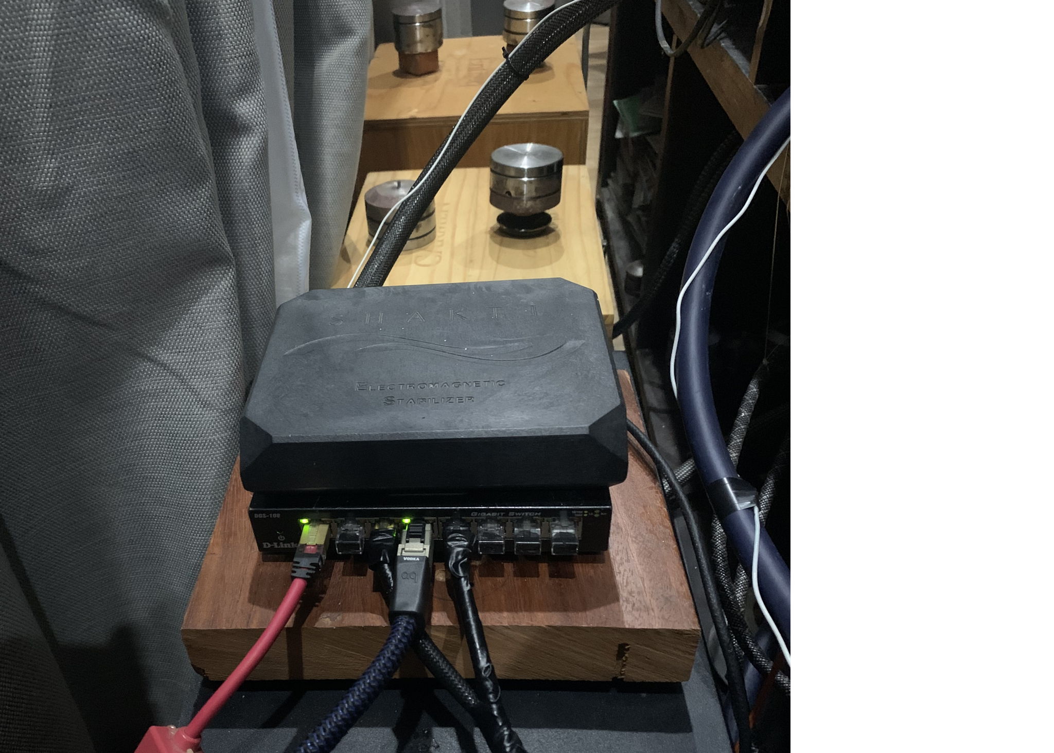 Shakti stone on top of Eqvox, Accustic Revive lan filter, all unused ports have naked plugs filled with silicone to reduce emi/rfi