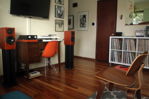 Wide view of our living room’s west wall.  The Eames chair gets moved when not actively listening. 