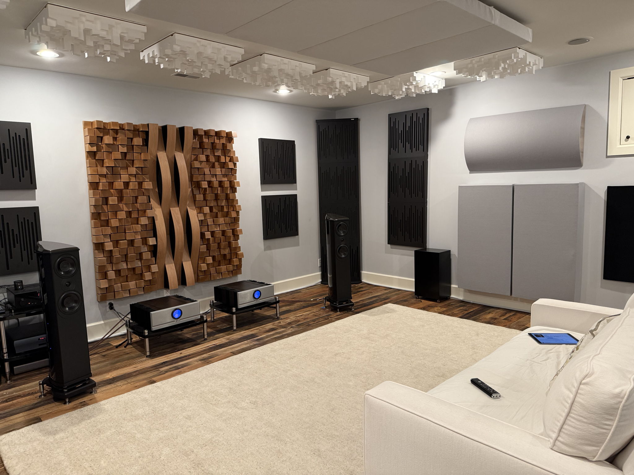 A mix of diffusion and absorption for reflection control throughout the rest of the room