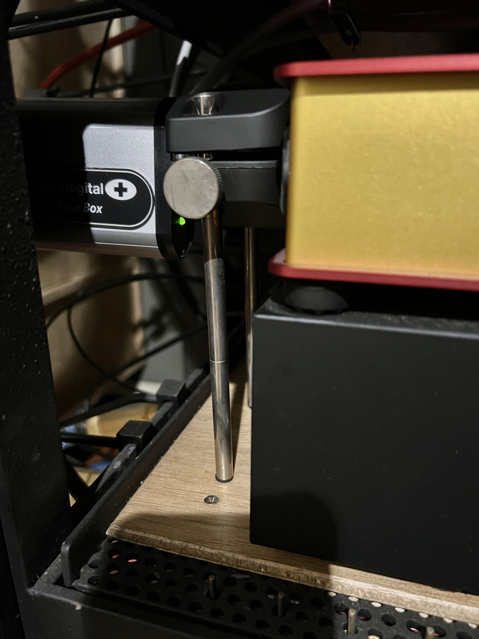 Customised Furutech NCF power connector support booster for preamp external battery supply. The booster supports a pure silver audiophile adaptor custom built by revelation audio labs, used to connect a digital fusebox to the battery supply. Common belief has it that external battery supplies remove all problems of dirty power entering the signal chain - nothing could be further from the truth. For each upgrade; of power cable to the battery supply of the Dartzeel pre; followed by connection to the primary unfiltered distributor; and finally, the inclusion of the Swiss digital fuse box and the replacement of the internal fuse of the battery supply with a graphene sluggo; the leaps in soundfield gains have been dramatic and conclusive: better power supply matters regardless of how clean one believes one’s power already is. Current thinking partially credits radical grounding configurations in the cables for the huge differences between cable solutions.