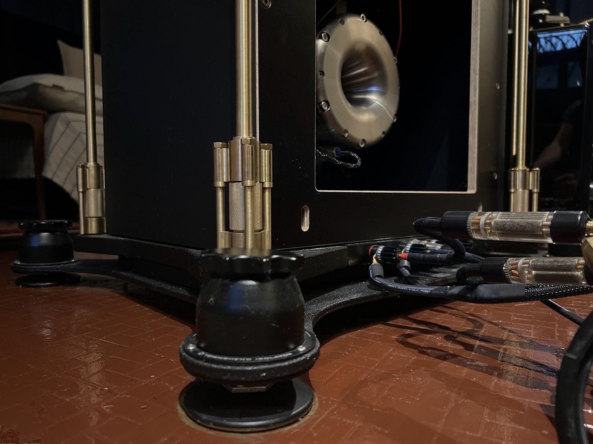 Low bass driver module and audio frame base seated on townshend isolation podiums. The custom brass frame support for the elac tweeter utilises the threaded holes originally intended for the proprietary WVL speaker feet for attachment and mounting.