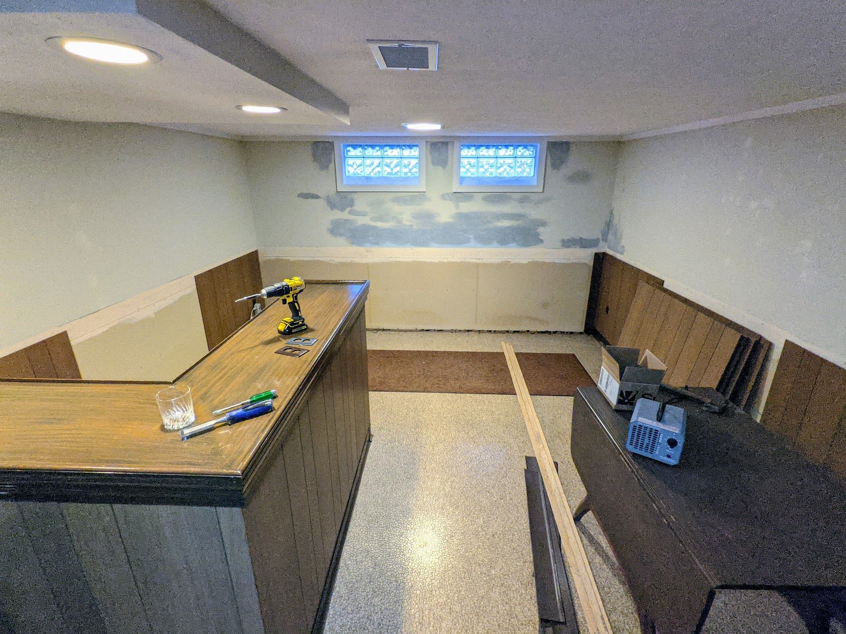 Beforehand with the bar and dropped ceiling area.