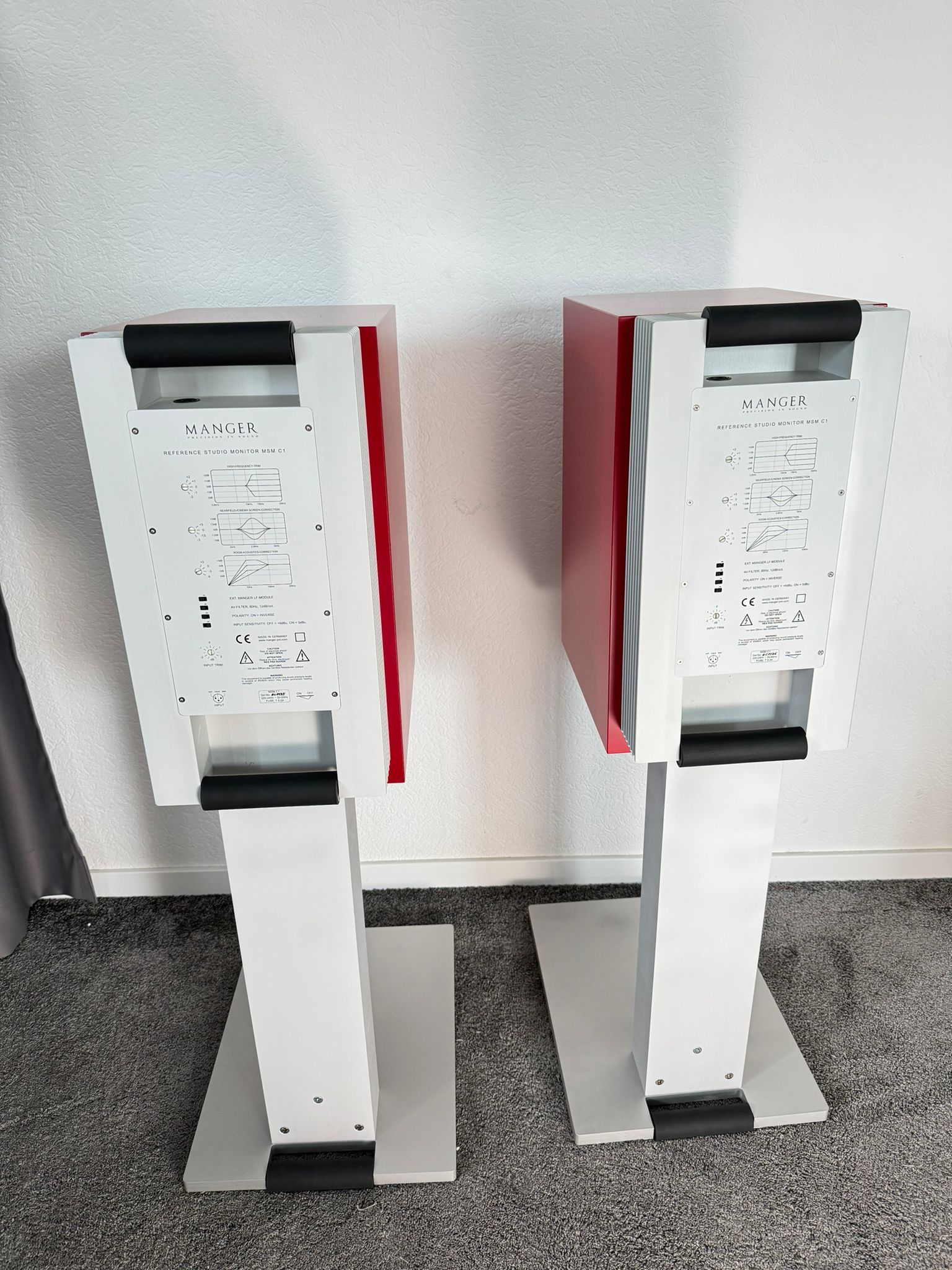 Manger GMBH MSMc1 speakers with stands in red 4