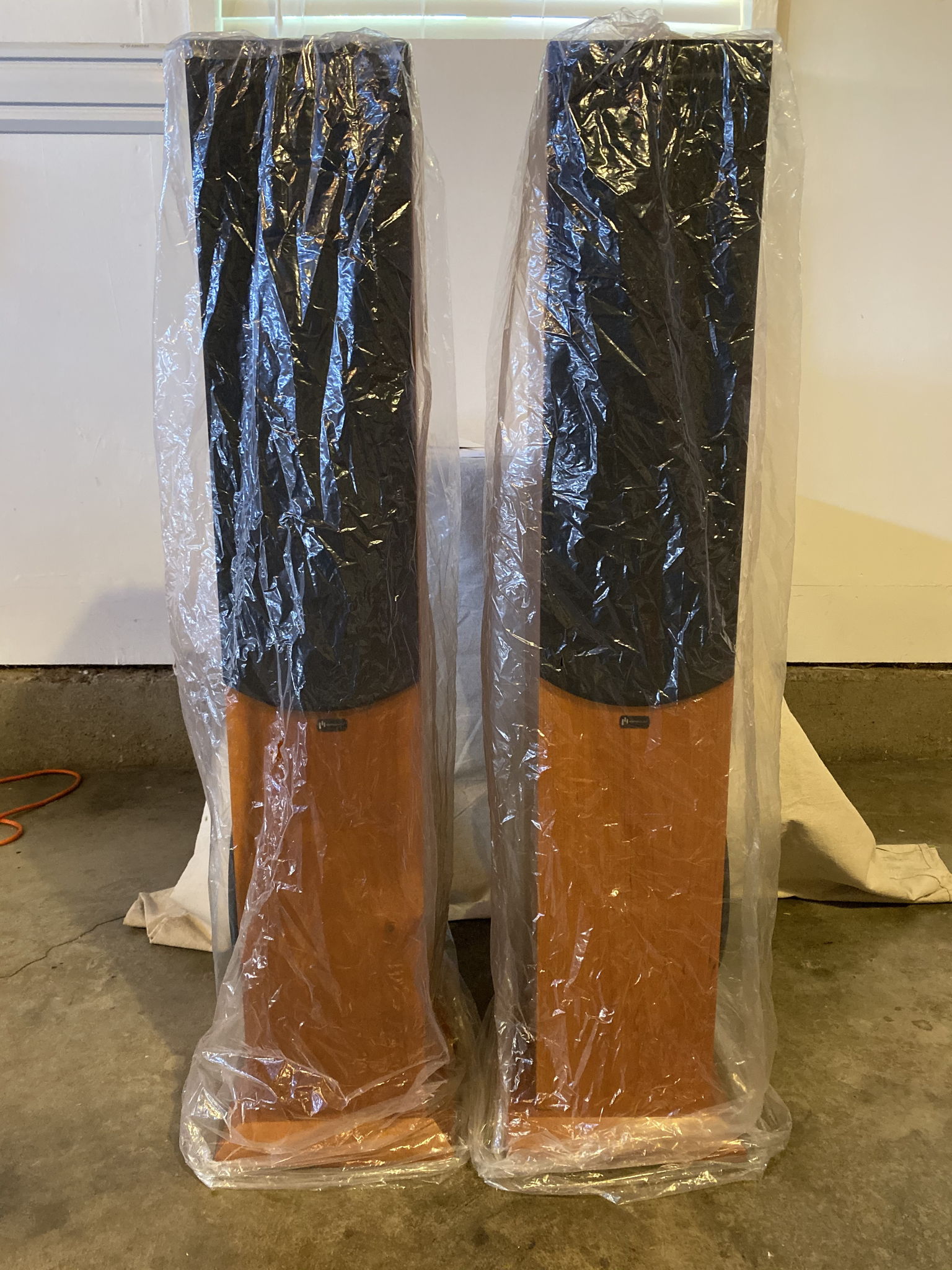 Speakers with original plastic covering