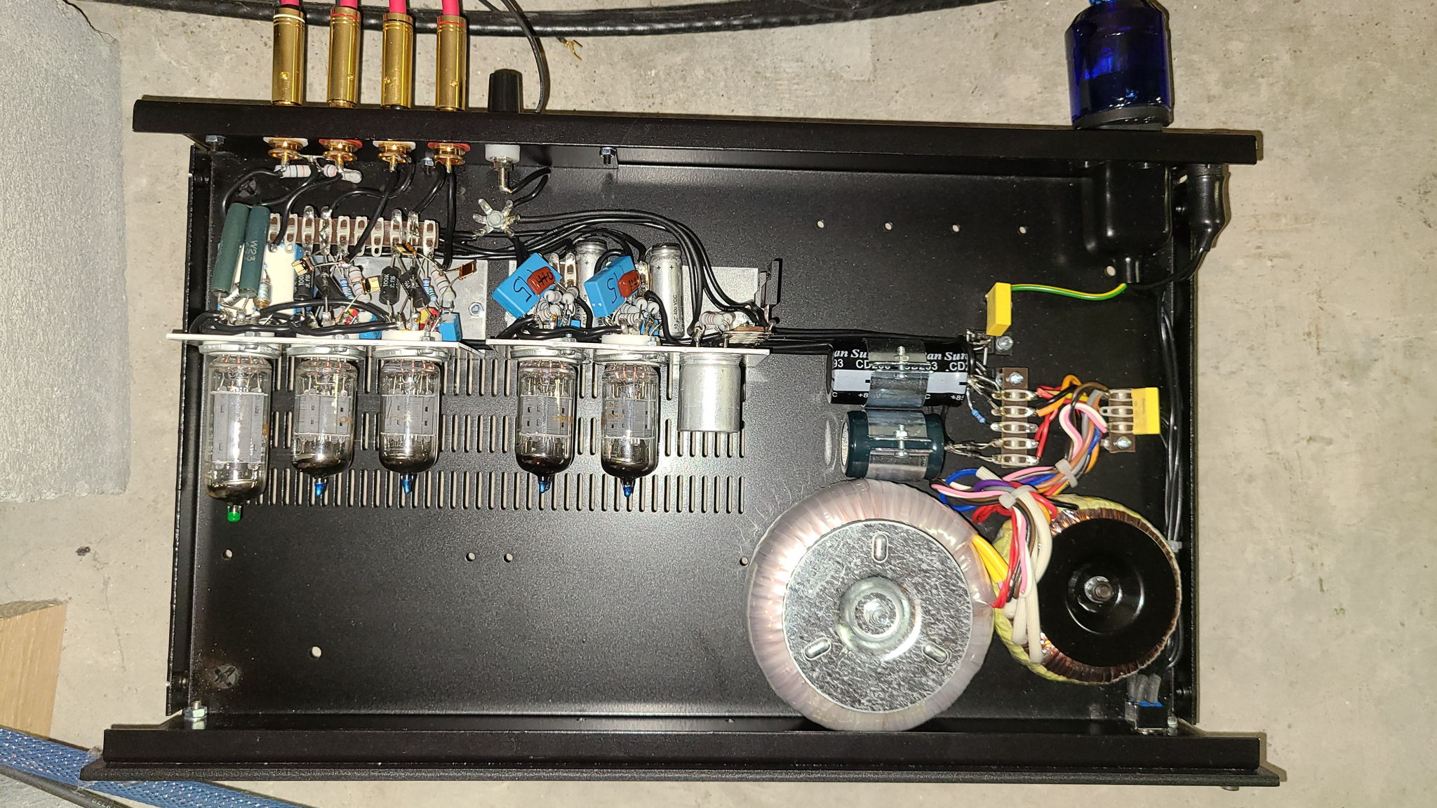 Phono amp for 12" arm. It's a RS circuit with a "R" power supply. Bulk foil resistors.