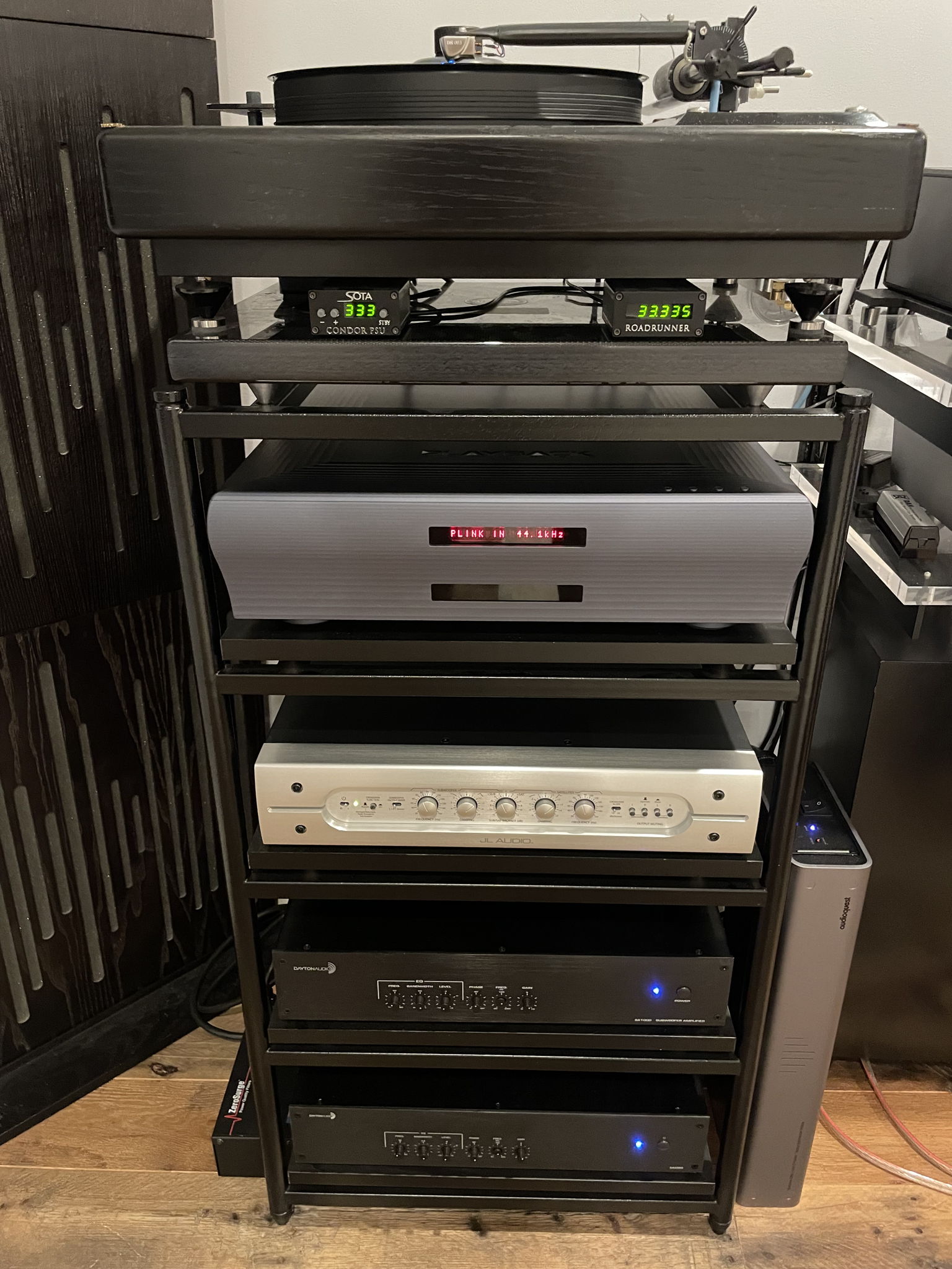 SolidSteel 410 Rack, Sota Condor PSU and Roadrunner tachometer, Black Diamond Racing Shelf for the Source, Playback Designs MPD-8 DAC, JL Audio CR-1 crossover, Tony Pardo LPS, Dayton Audio SA-1000 subwoofer amp x 2, Audioquest Niagra 1200 power conditioner, ZeroSurge 2R15 surge protector