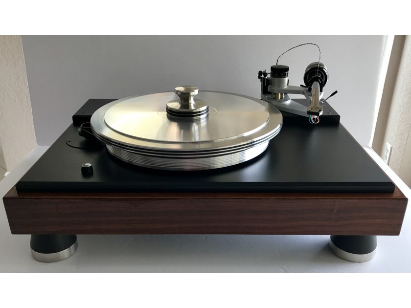 VPI Classic 4 Turntable in Rosewood Finish with 12.5 Fatboy gimbled Tonearm with Nordost Reference wire. Table also comes with the Periphery Ring and HRX Center weight
