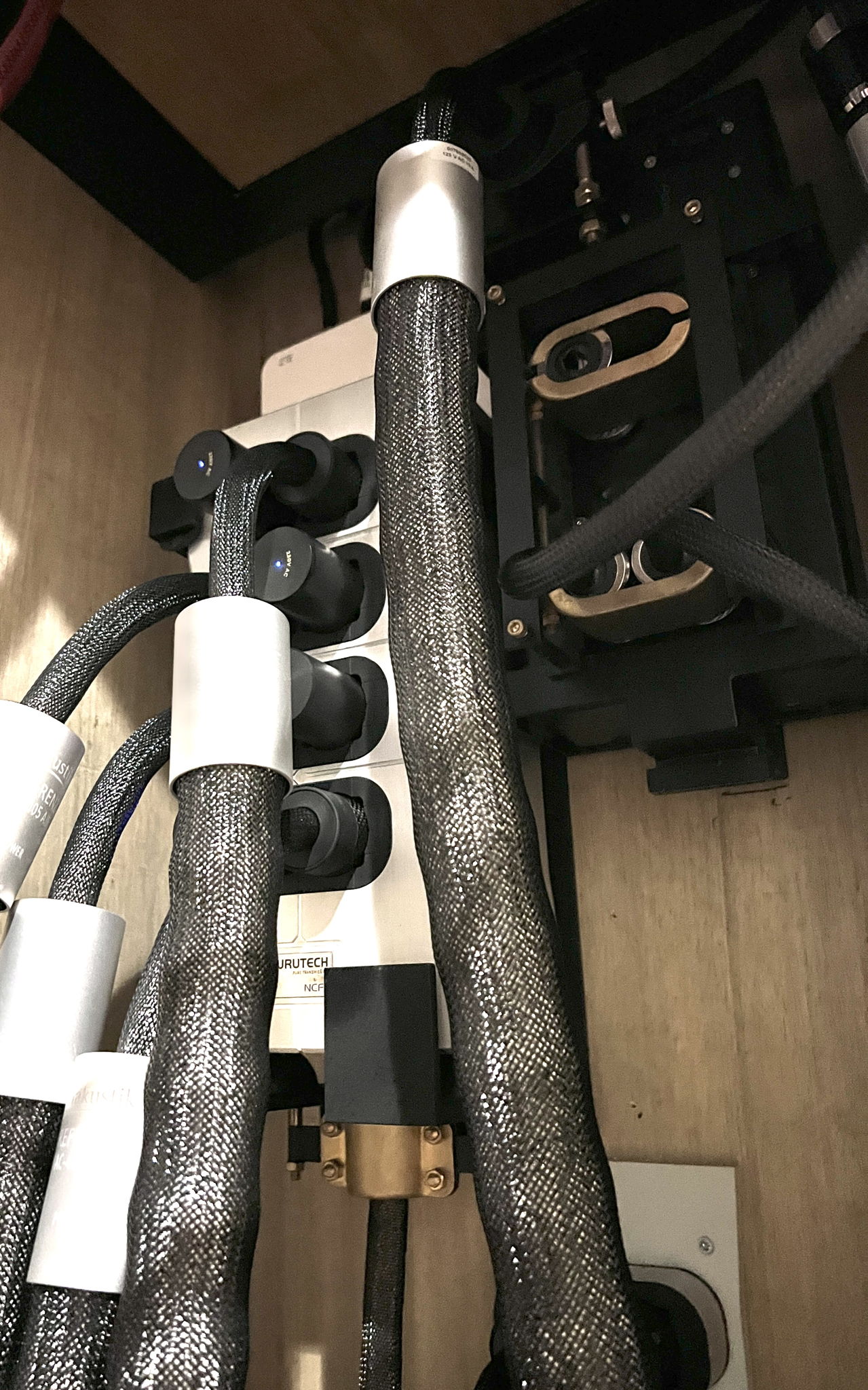 The shielded and unfiltered Furutech powervault to the left and the SA-TT7 filtered distributor to the right. Both distributors employ customised isolation holsters mounted to the 50mm plywood backing wall - the vault feeds all power hungry equipment downstream, while the SA-TT7 feeds all equipment at the head of the source.