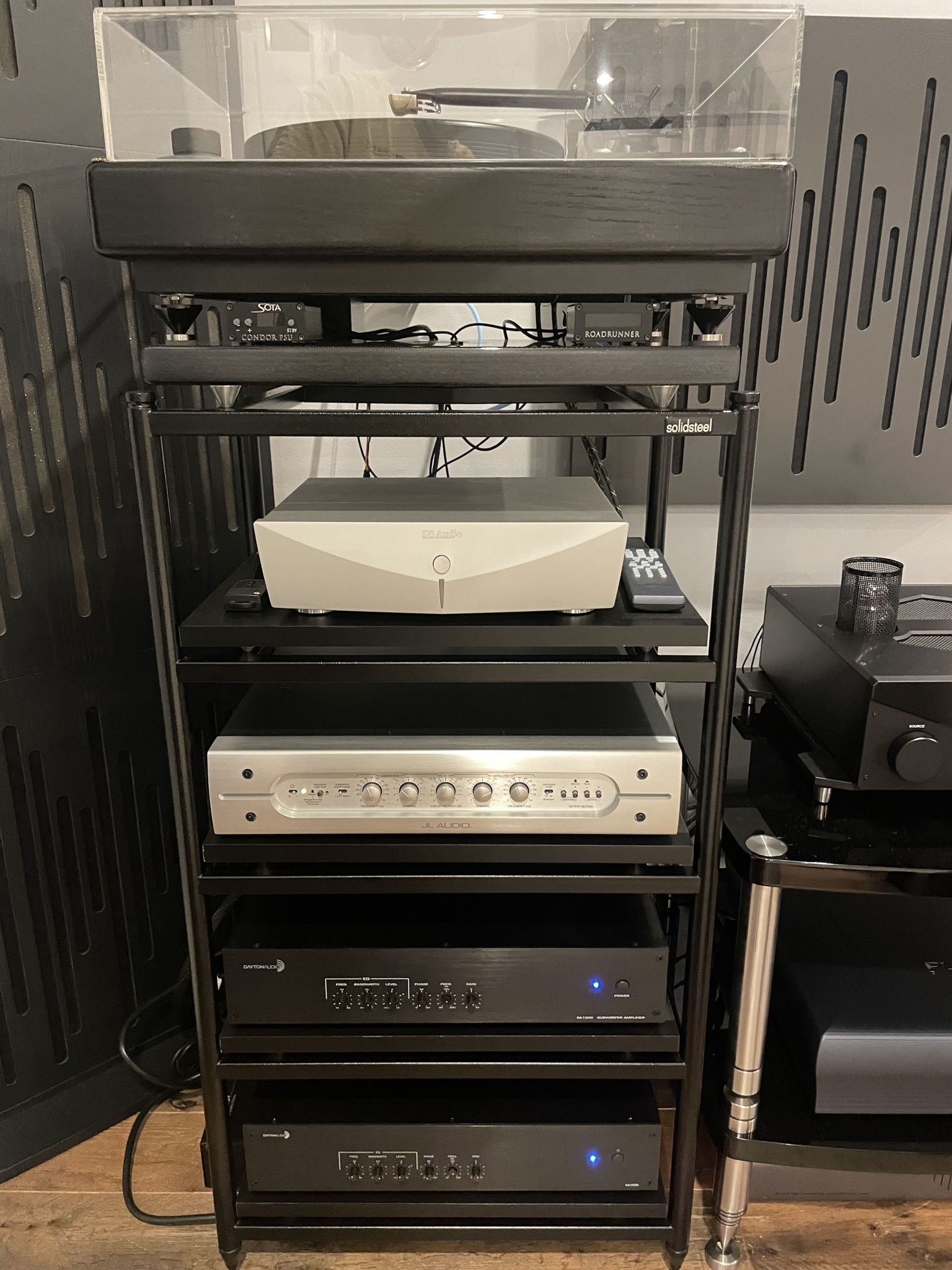 SolidSteel 410 rack, Sota Condor PSU and Roadrunner tachometer, Black Diamond Racing Shelf for the Source, DS Audio DS003 Equalizer, JL Audio CR-1 crossover, Dayton Audio SA-1000 subwoofer amp x 2