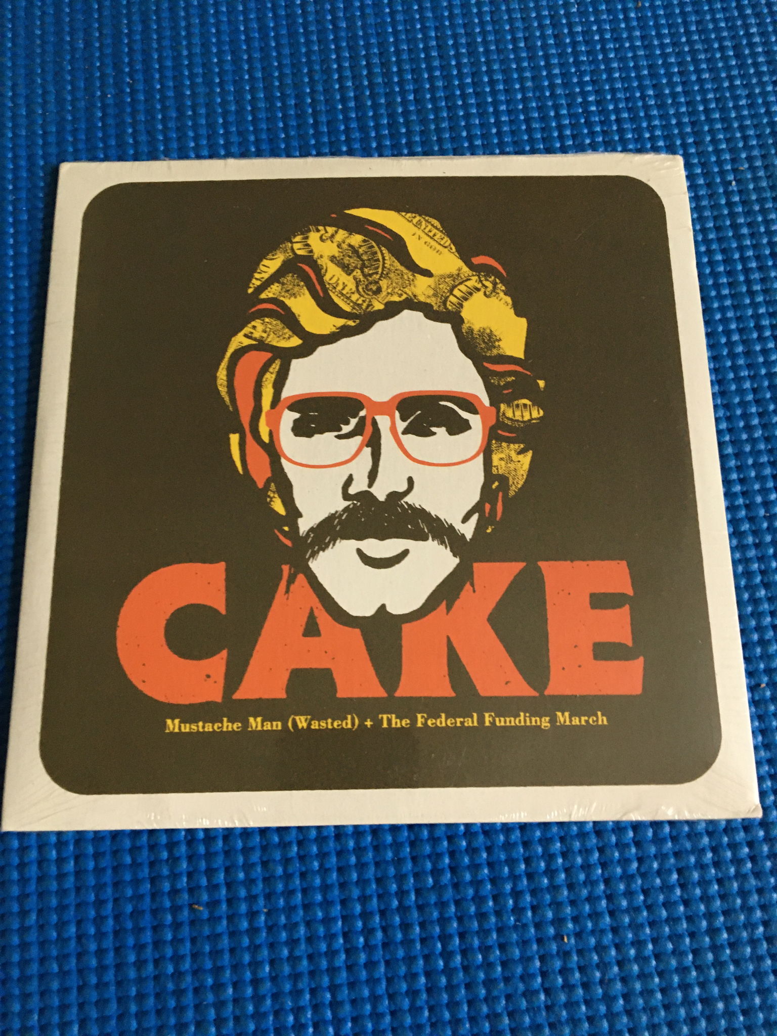 Cake sealed 7” record  Mustache man / federal funding M...