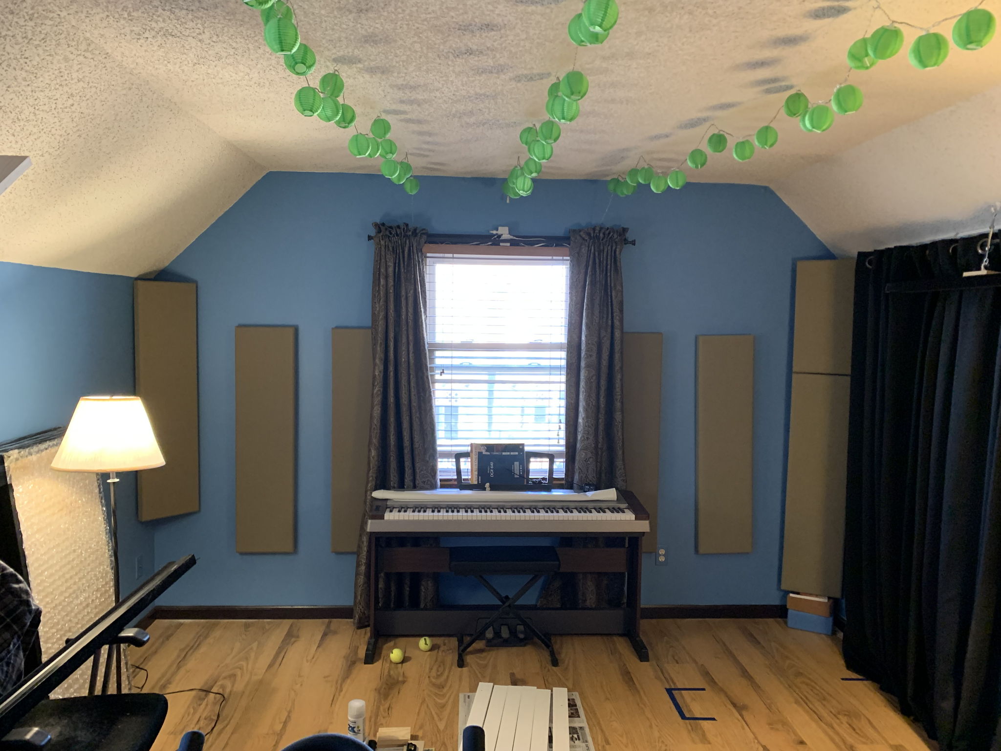 Hanging the first set of sound panels. The room has a total of 58 sound panels. A mix of absorbers and diffusers. Not to mention a few strategically placed pillows and rugs. 