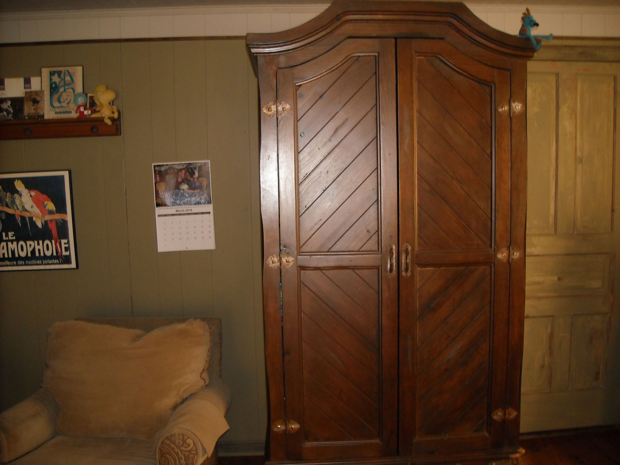 Chair is slid in front of the cabinet about two feet out with another panel leaning behind me.It really should be moved elsewhere but the panel kills any reflections and everything sounds fantastic!