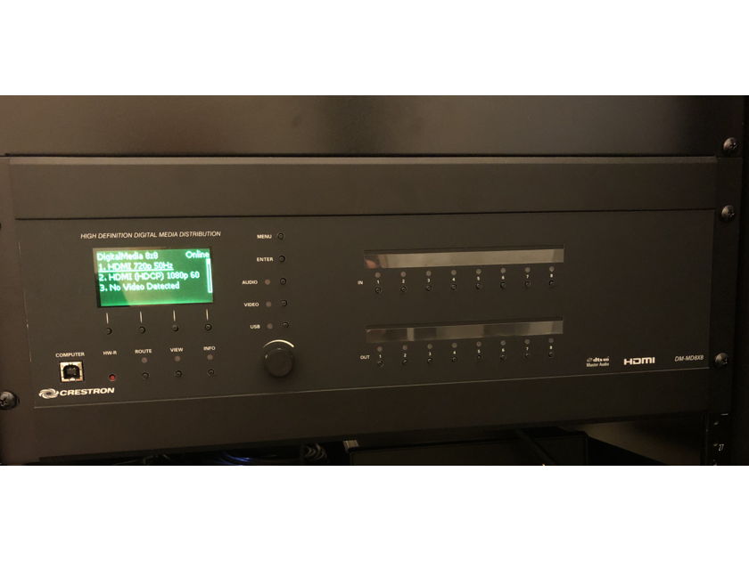 Crestron DM-MD8X8 with installed DMC-HD-DSP and DMC-VID-RCA-A input cards and DMCO-55 output cards