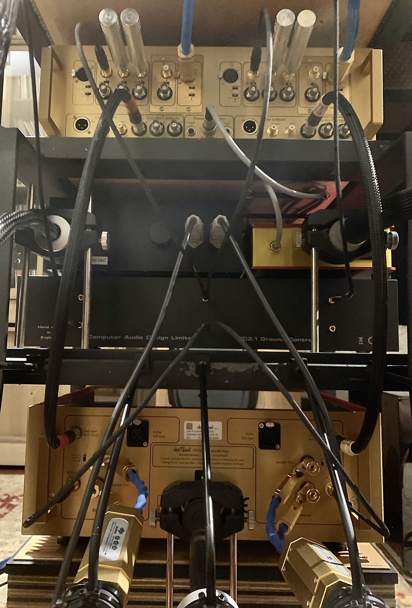 Lower tier rack rear - CAD signal grounding box, power supply for WVL Son speaker, and external battery supply for preamp sitting atop. No two grounding wires, power and interconnect cables are touching, and are in complete isolation of everything else, from port to port, the simple advantage of a vertical stack in cable organisation.