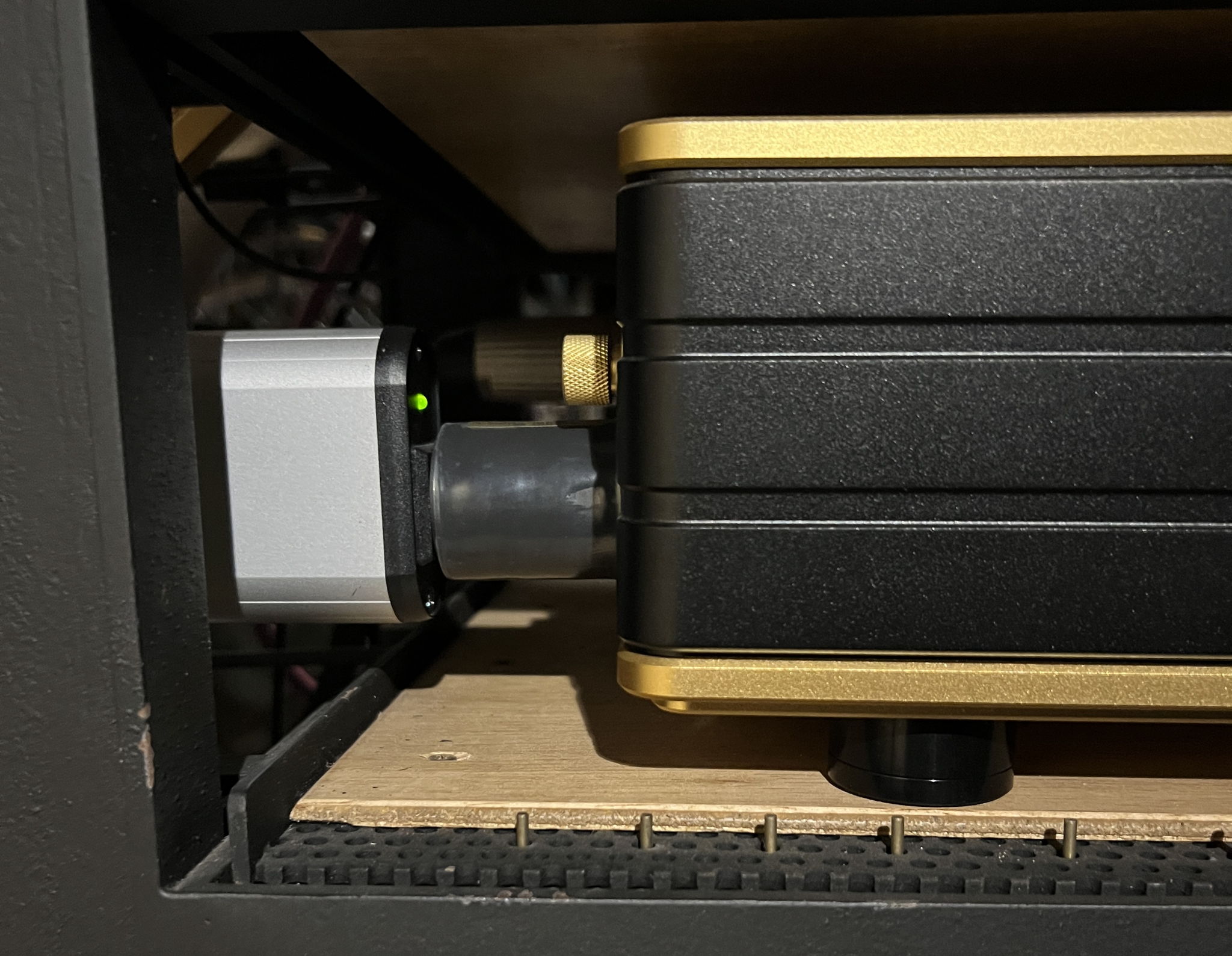 The swiss digital fuse box plugged into the DAC - a specially constructed adaptor custom built from Furutech rhodium pins internally wired with 9gauge pure solid cryosilver material by Revelation Audio Labs connects the two components. While the additional interface of fusebox and adaptor logically curtails a more direct power flow, the immense gain already achieved just by replacing the regular fuse with the graphene sluggo presents convincing argument of the bottleneck the traditional fuse has always been suspected of, rendering the effects of all other connection interfaces secondary, in comparison. 