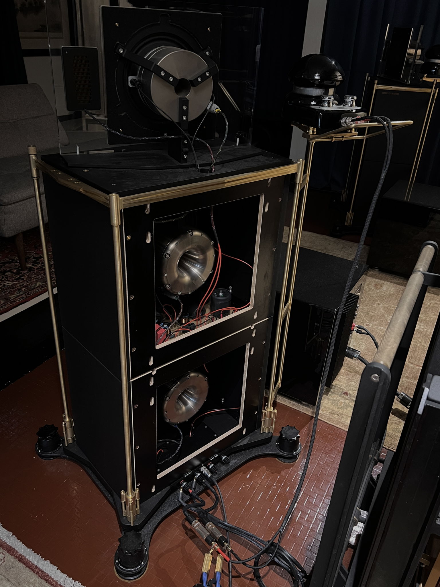 Exposed rear of Chicagos showing the three massive field coil drivers, with the lessloss speaker firewalls sitting between speaker binding posts and speaker cable.