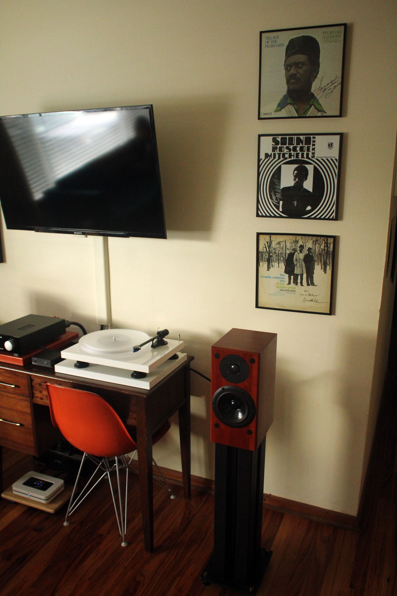 Autographed LPs by Ornette Coleman, Roscoe Mitchell, and Pharaoh Sanders watch over.
