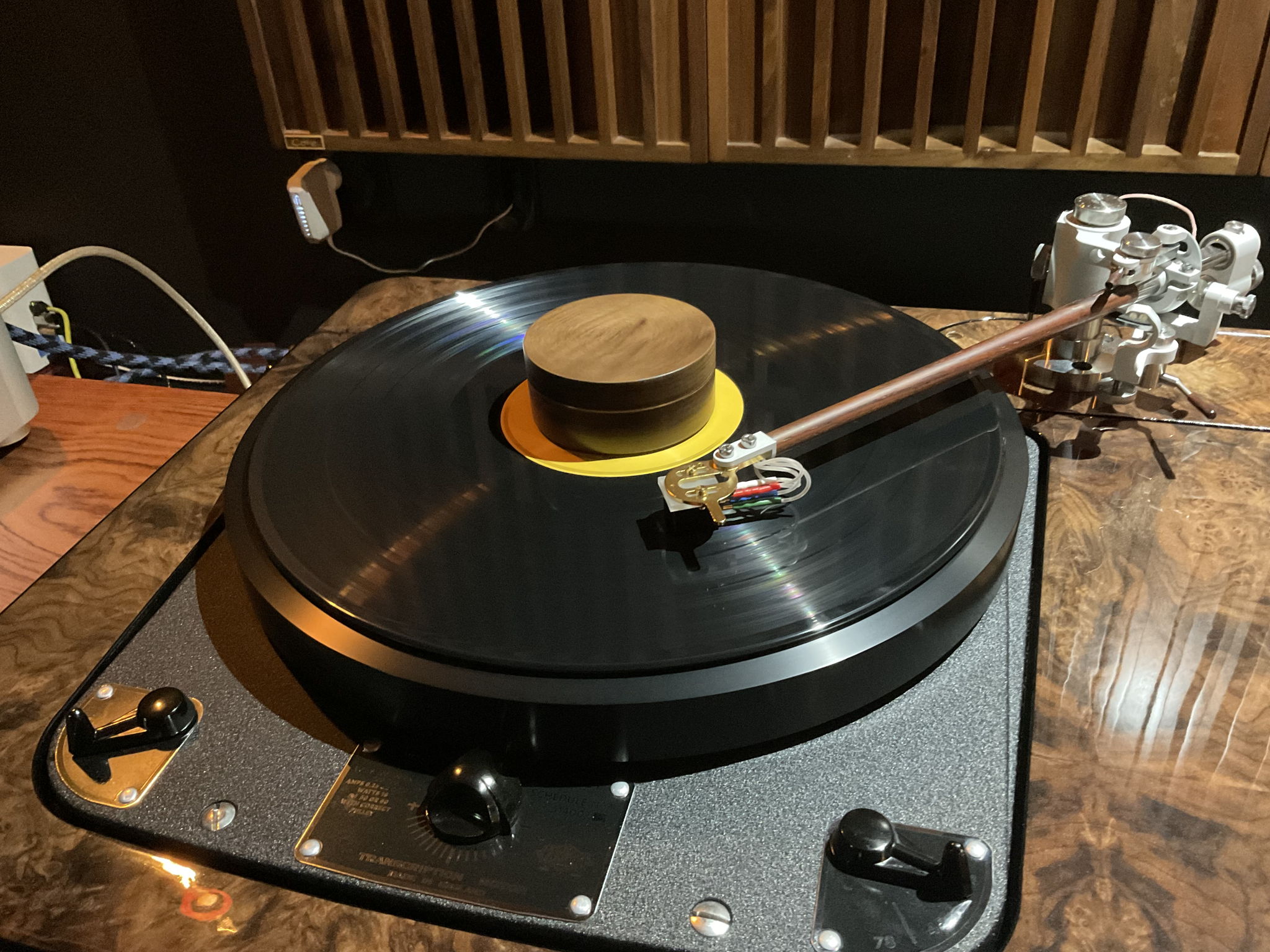 custom walnut and copper heavy-weight vinyl record stabilizer.