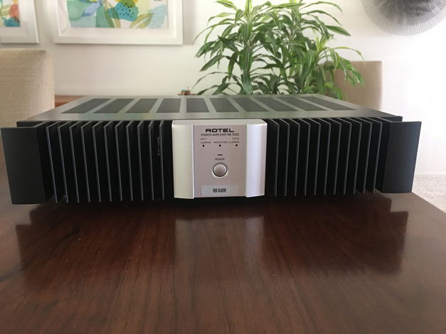 Pair of Rotel RB-1050 amplifiers and 1 remote