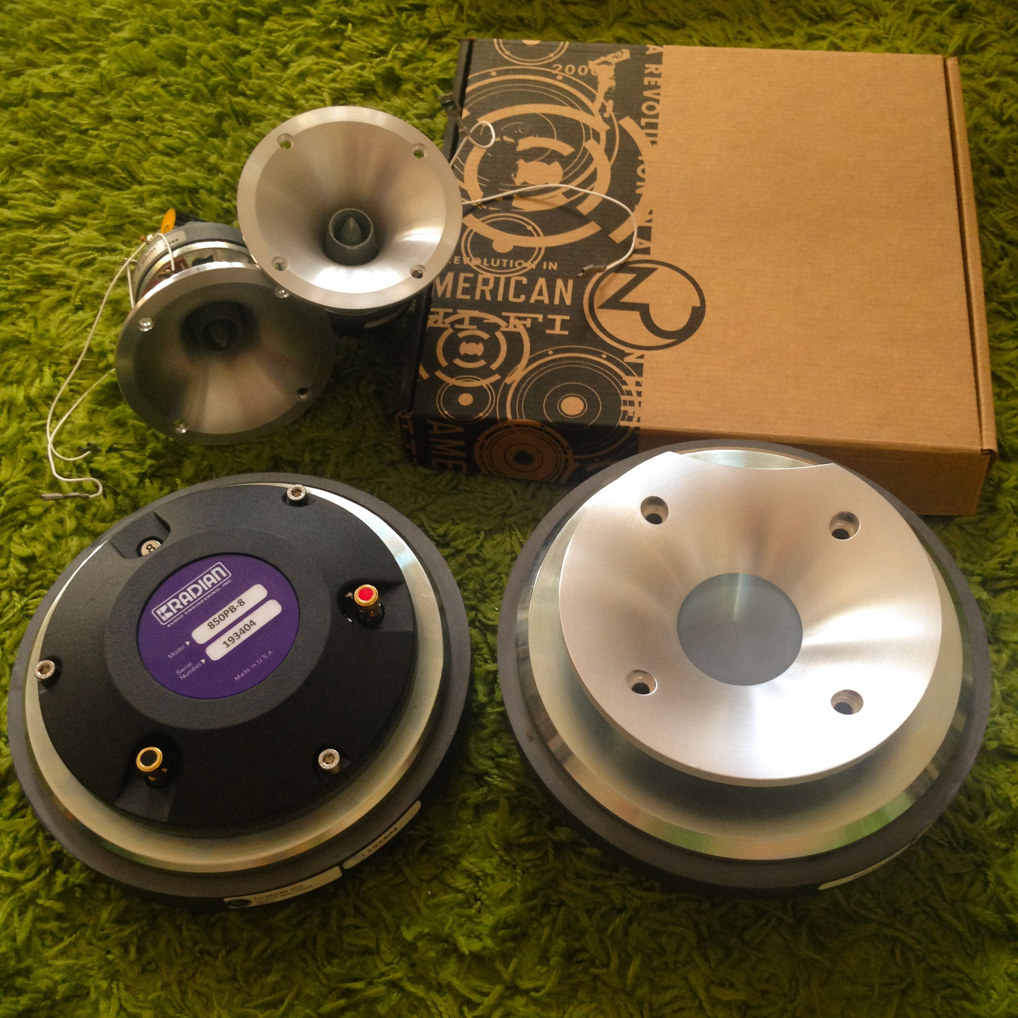 Old and new generation of Zu Audio Druid super tweeters with lenses.