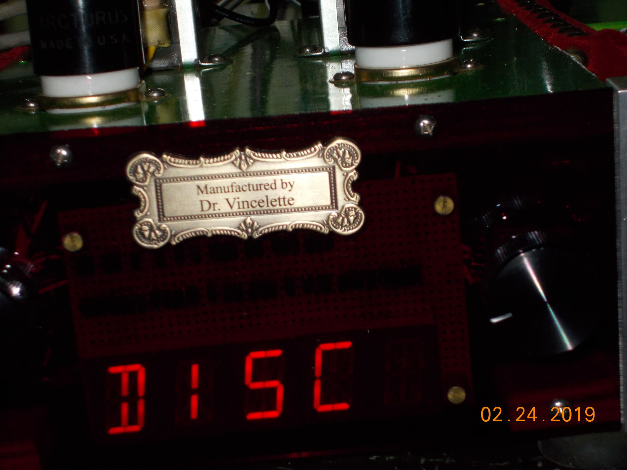 The preamplifier with LED display controlled by the source selector switch. The display has many small diodes to light up the secments to show which source is chosen.