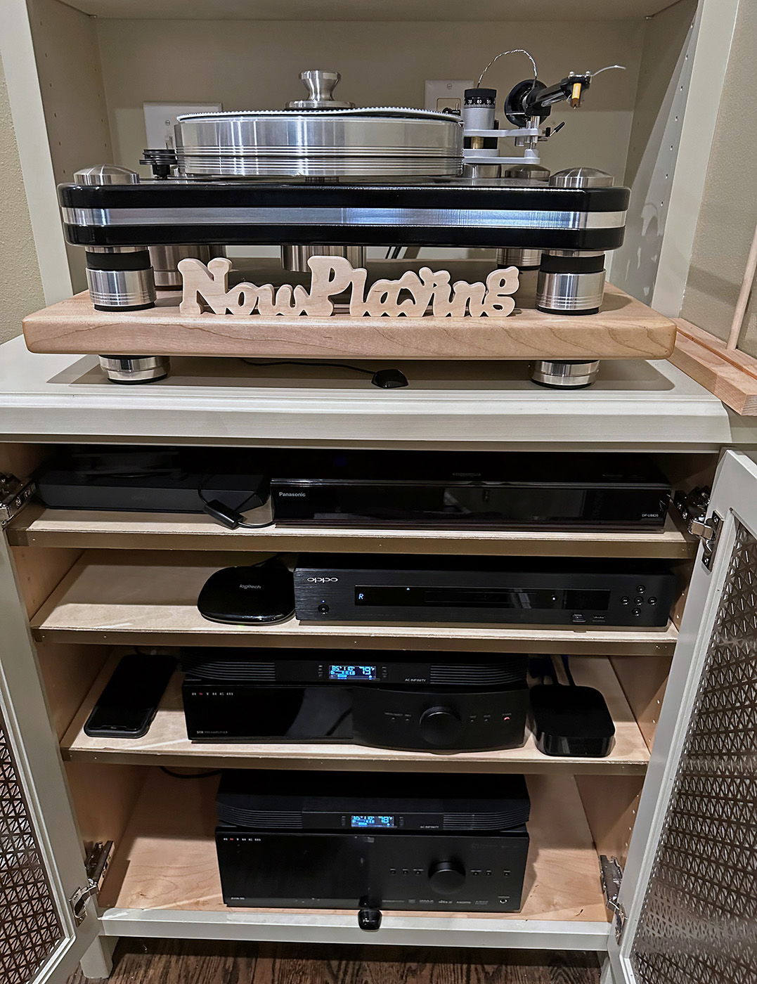 Family Room Cabinet (Amps in crawl space cabinet betow family room.