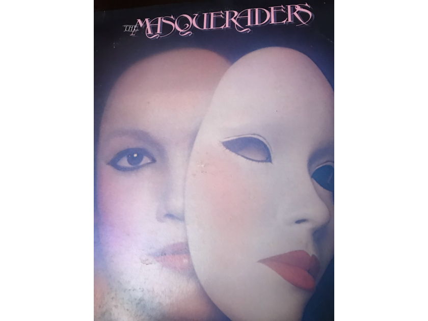 THE MASQUERADERS THE MASQUERADERS