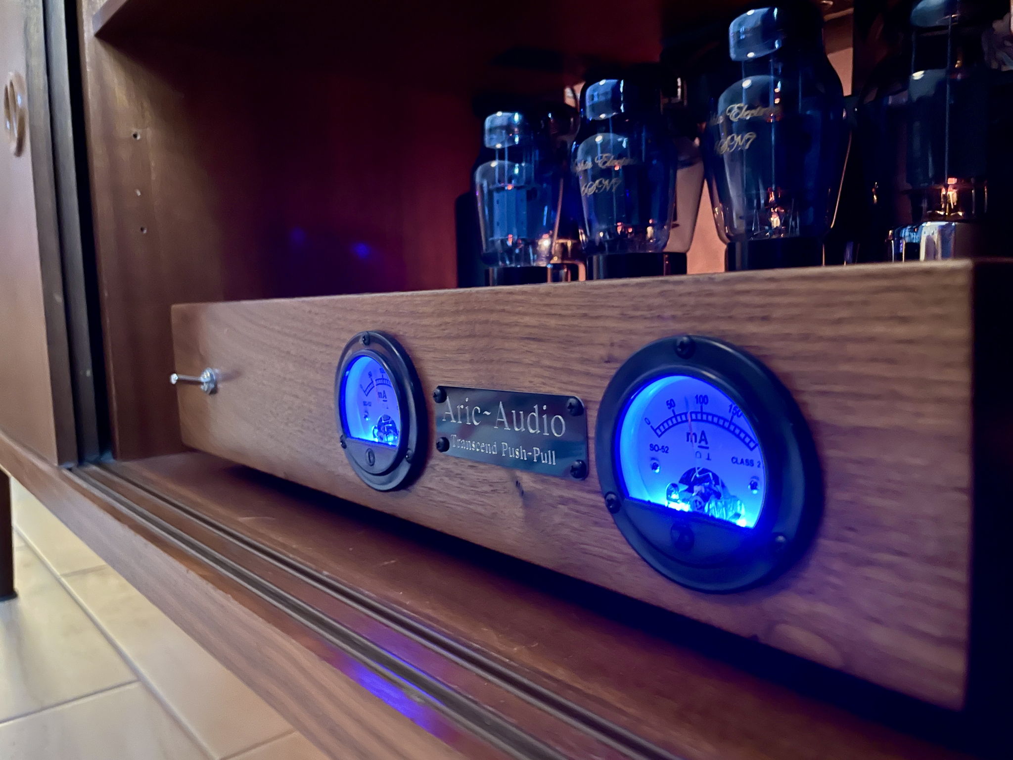 This needs to be on top of the credenza, but it’s not - two computer fans aiding with airflow - Aric Audio Transcend PP Integrated