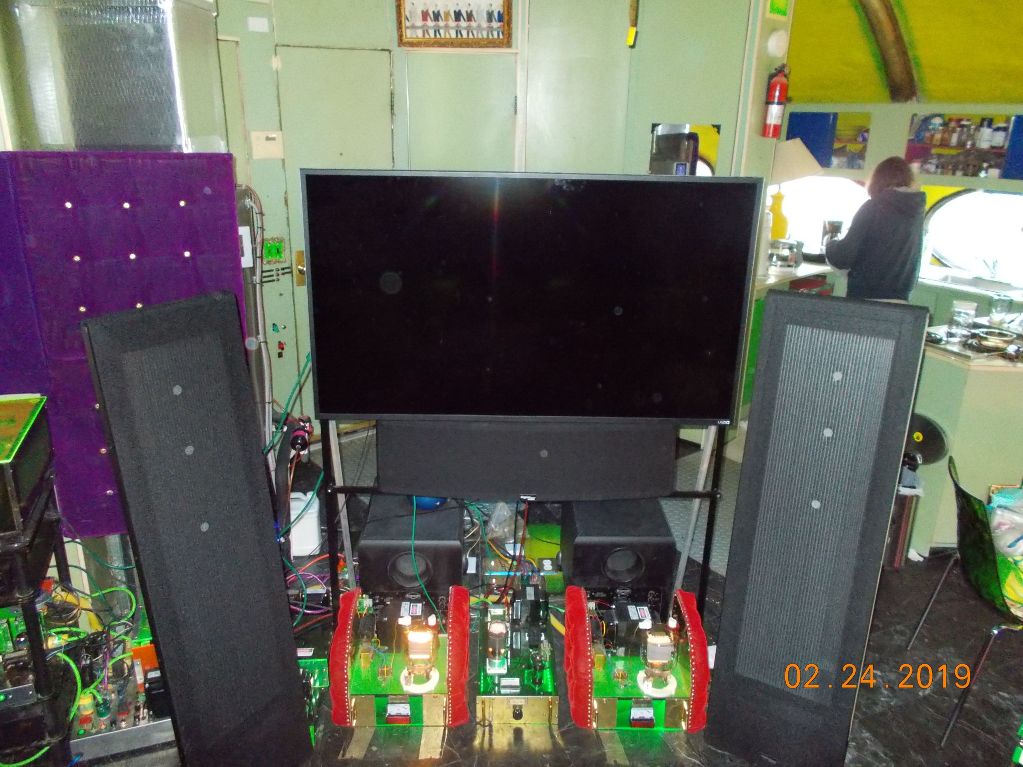 The front speakers, Magnepan 0.7's the center channel speaker, Magnepan MMG c and a VISIO 65" screen