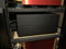 The repurposed CAD GC3.1s stacked on above the other, on a shelf between the preamp and the amp below.