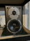 Bookshelf speaker on a shelf