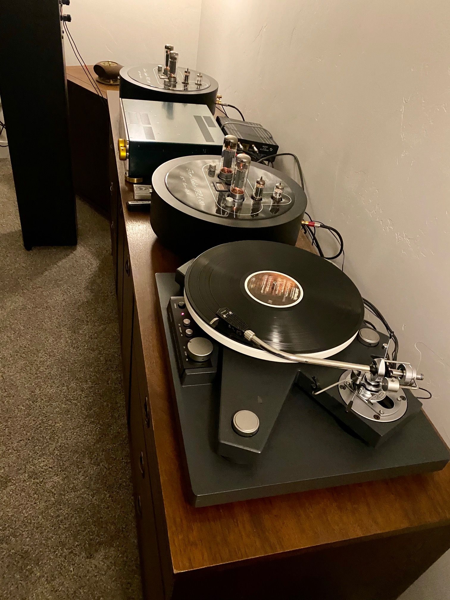 Components on their vintage credenza