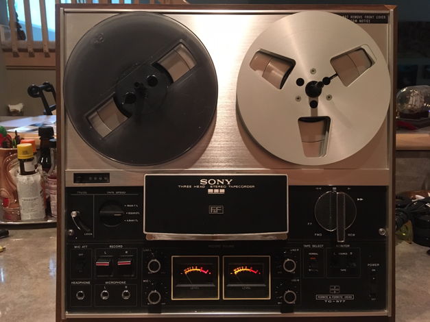 Tape Deck shown in upright orientation with included take-up reels