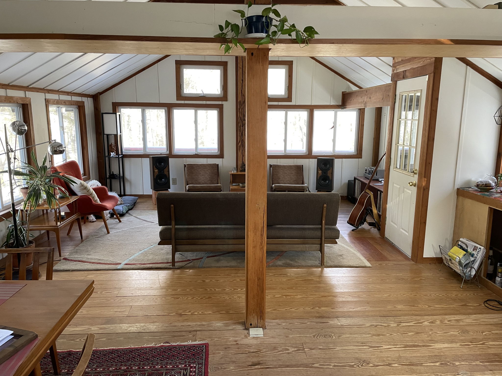 The living room/listening zone is part of a larger open space.