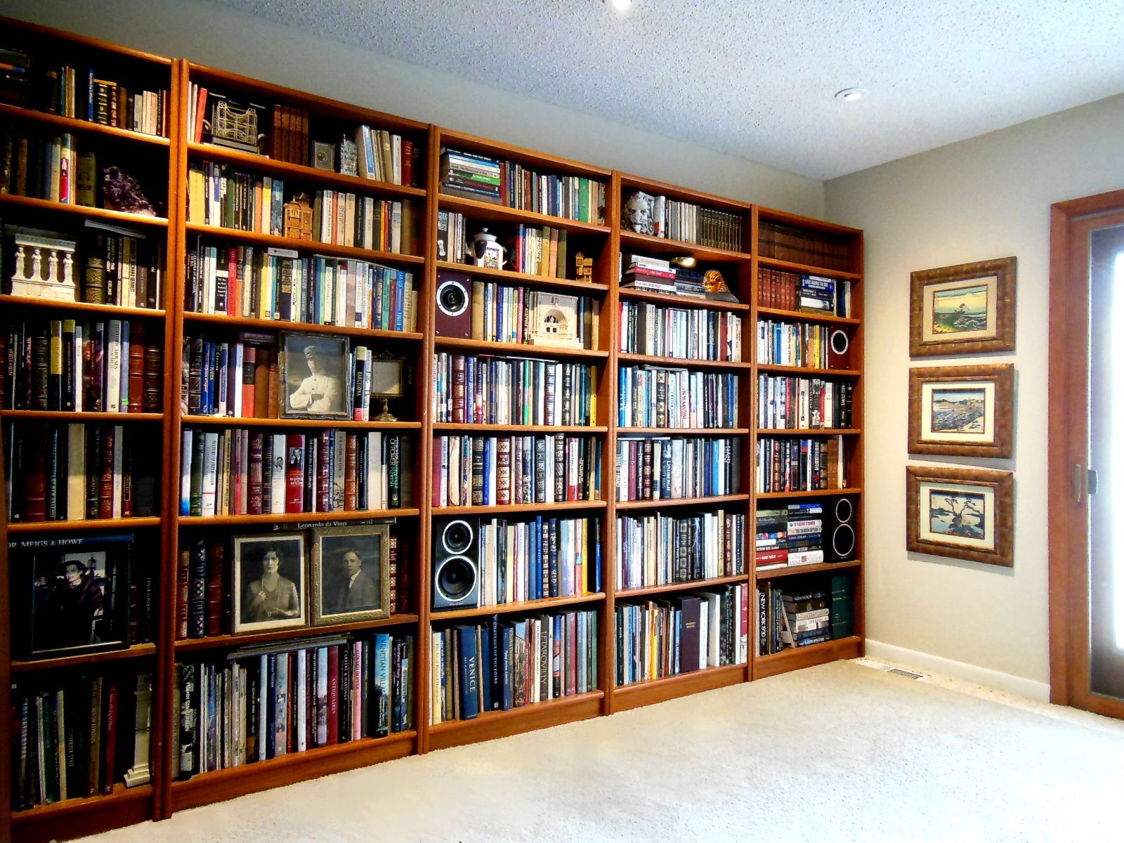 Looks like a wall of books, but I've done the unthinkable and put bookshelf speakers in a bookshelf!  Upper are Teac Concentrics and Lower are Wharfedale Diamond 220s.   This is more about fun than anything else, as it's in the same room as the big Mac speakers