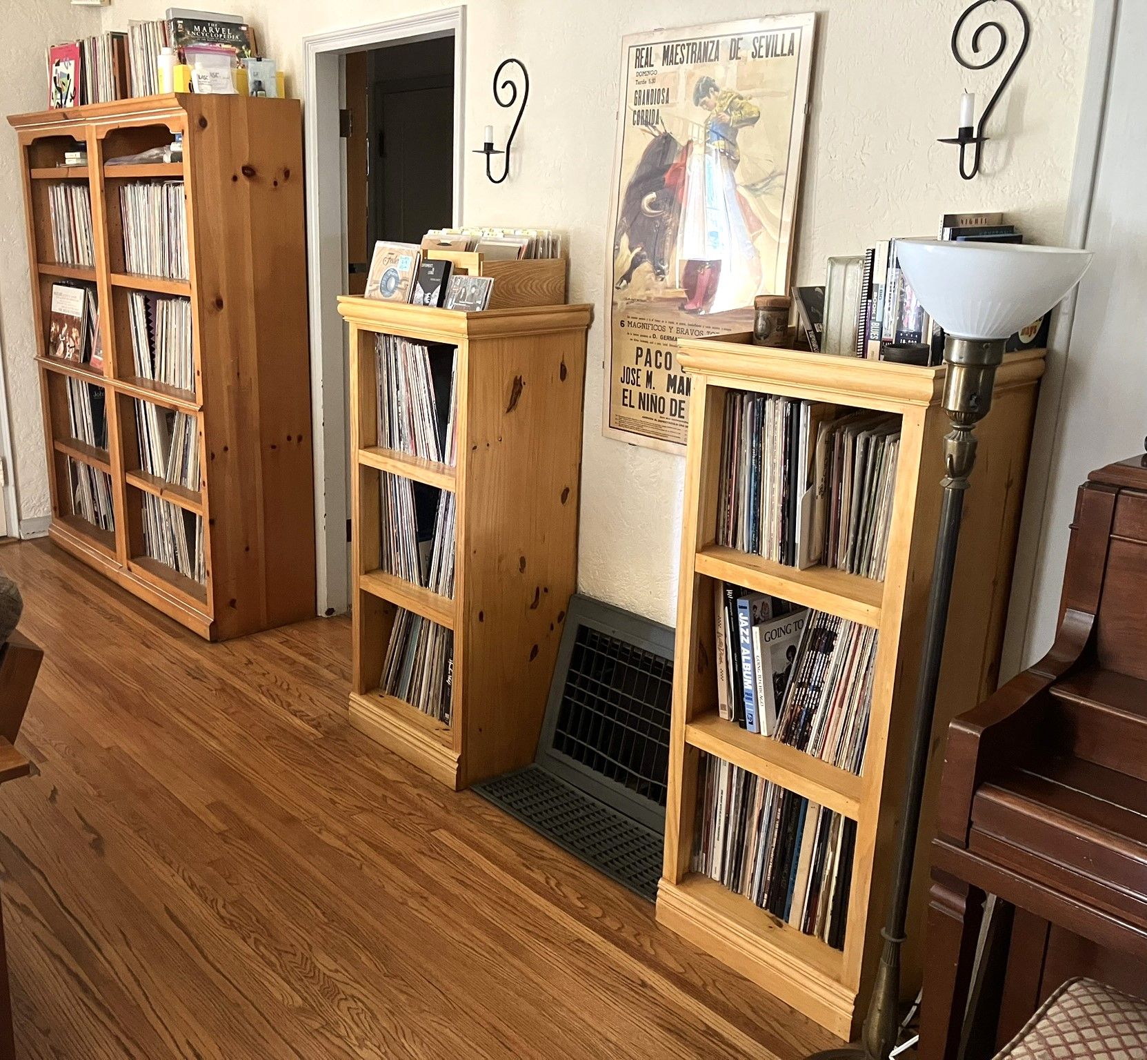 Ever expanding vinyl collection.  I built the two smaller cabinets to match the style of larger commercial cabinets I bought years ago and thought I would never fill-up.  :)